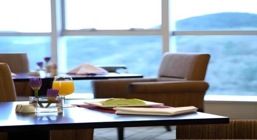 Grand Mercure Teda Dalian Buitenkant foto