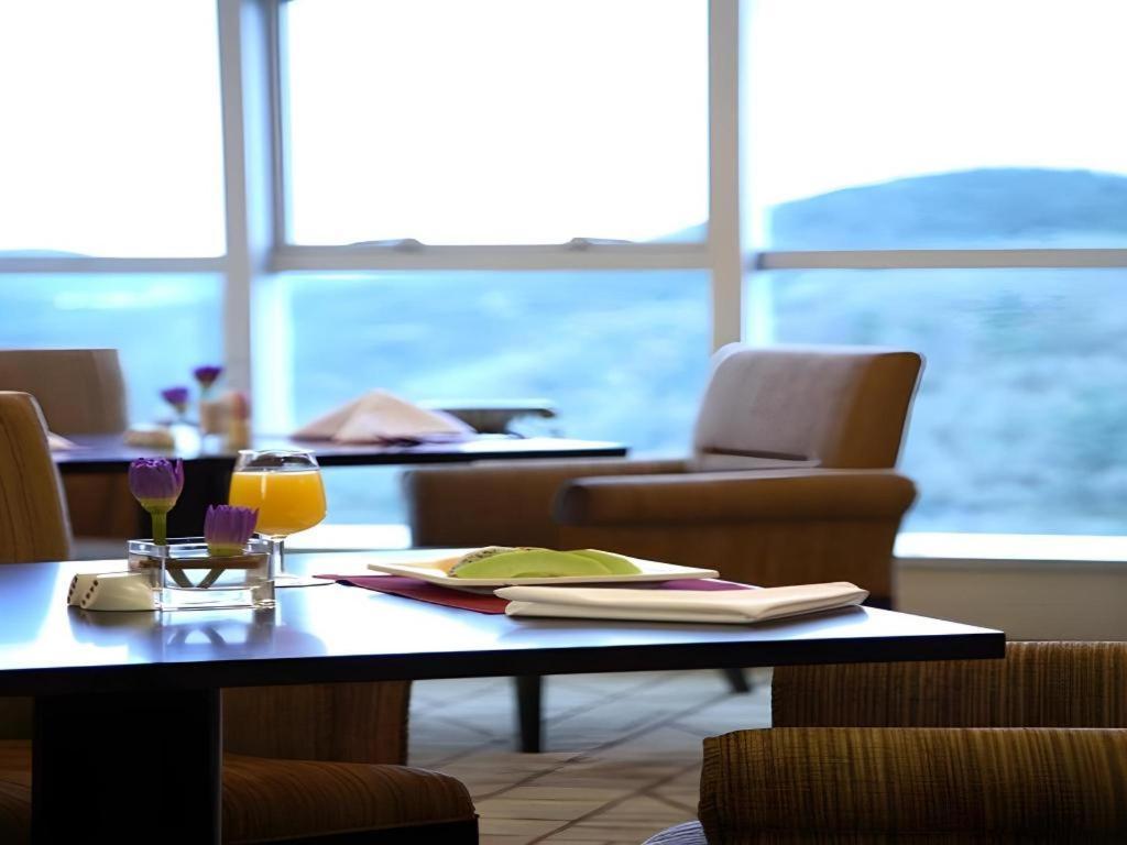 Grand Mercure Teda Dalian Buitenkant foto